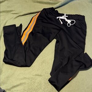 Stylish Black Joggers with Vibrant Orange Stripes